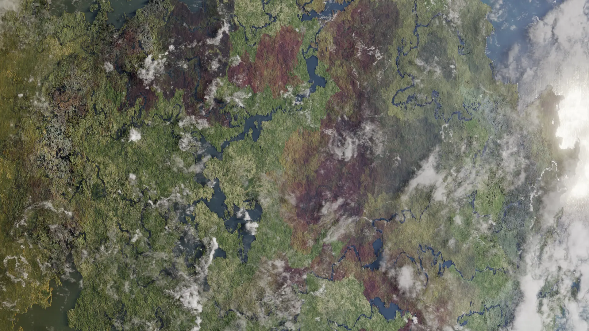 Large landmass with small bodies of water and clouds floating above