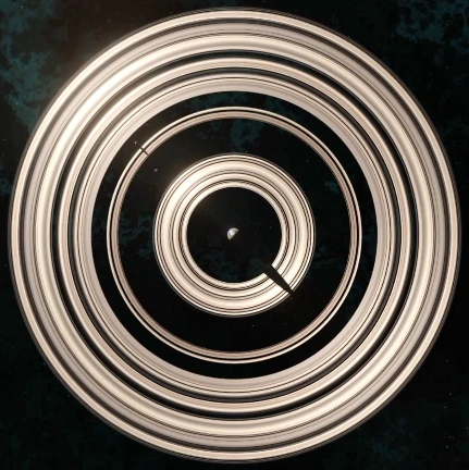 Top view of a planet with bright concentric rings, with a small planet at the center surrounded by a dark space background.
